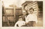Frank Adlard on knee <brother ?> and Father??? <same locale as 7c>