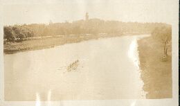 Rowing <looks like Yarra with Government House>