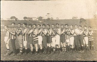 Football Team - New Town <Glenorchy> or Lefroy? Ted Winters 4th from left, probably Roy Totham 5th from left